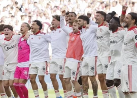 sevilla strike late to boost survival hopes celta edge atletico
