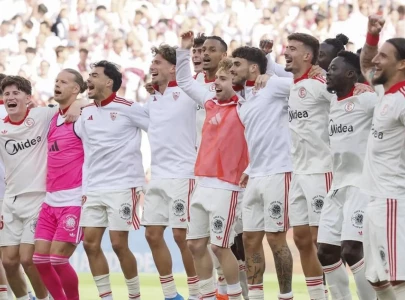 sevilla strike late to boost survival hopes celta edge atletico