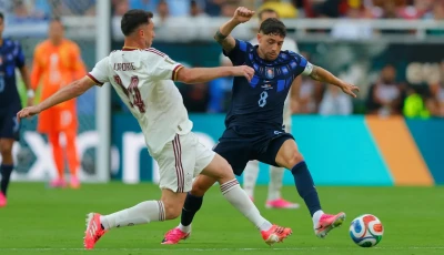 uruguay s federico valverde right vies for the ball with spain s aymeric laporte during their world cup group stage match photo afp