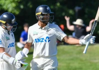 superb batting new zealand s rachin ravindra right is congratulated by tom latham after reaching 150 against west indies photo afp