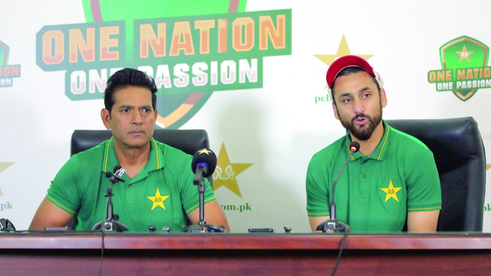 interim head coach aqib javed and t20i captain salman ali agha address the media in lahore photo pcb