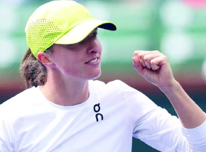 swiatek surges into quarter finals at rainy indian wells swiatek surges into quarter finals at rainy indian wells