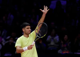 spain s carlos alcaraz celebrates winning his hyundai card super match against italy s jannik sinner photo reuters
