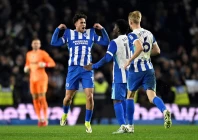 brighton hove albion s charalampos kostoulas celebrates scoring their first goal with carlos baleba and jan paul van hecke photo reuters