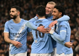 manchester city hope to catch premier league leaders arsenal photo afp