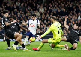 tottenham hotspur s dominic solanke scores their first goal past manchester city s gianluigi donnarumma action photo reuters