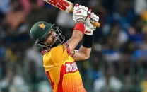 zimbabwe beat sri lanka to go top of group b