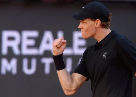 jannik sinner is the overwhelming favourite in the men s draw in the absence of injured rival carlos alcaraz photo afp