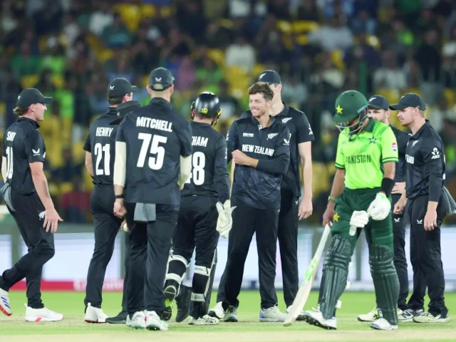 new zealand captain mitchell santner and teammates celebrate the wicket of babar azam photo icc new zealand captain mitchell santner and teammates celebrate the wicket of babar azam photo icc