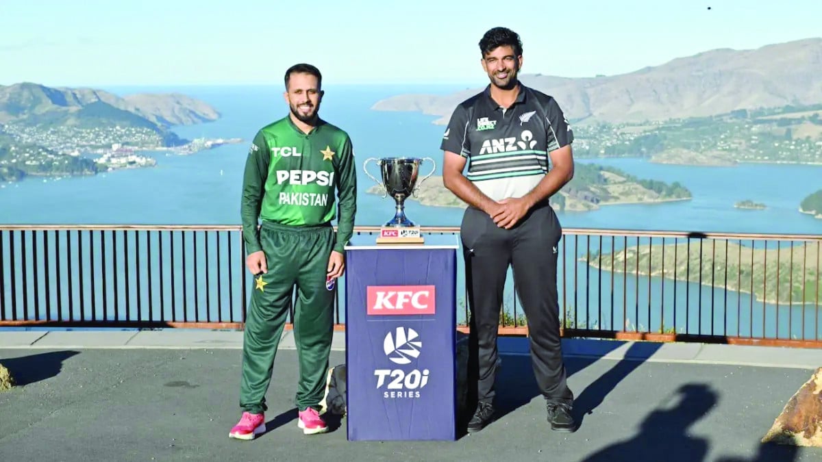 pakistan s mohammad haris l and new zealand s ish sodhi r pose with the series trophy photo cricket new zealand