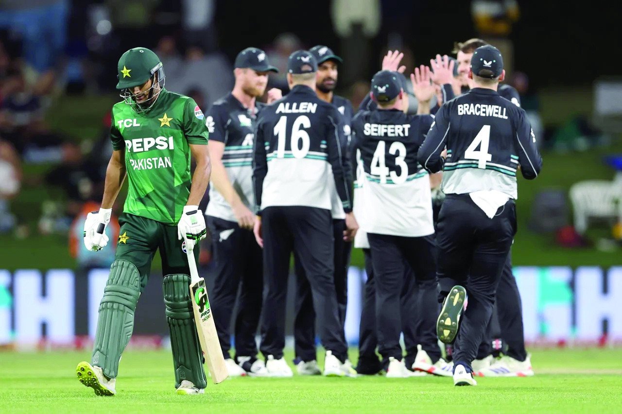 hasan nawaz walks away as new zealand celebrate the early wicket photo afp