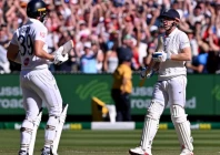 england s jamie smith left and harry brook celebrate after seeing england to a four wicket victory photo afp