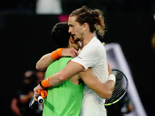 spain s carlos alcaraz hugs germany s alexander zverev after winning his semi final match photo reuters spain s carlos alcaraz hugs germany s alexander zverev after winning his semi final match photo reuters