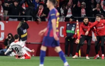 barca suffer title defence blow in girona