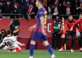girona s midfielder fran beltran celebrates scoring his team s second goal against barcelona in the thrilling derby clash on monday photo afp
