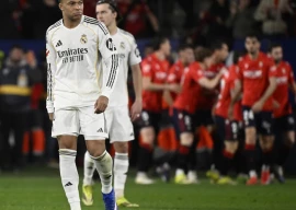 real madrid were left stunned as osasuna beat them 2 1 on saturday in an exciting la liga clash at el sadar in pamplona photo afp