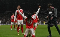 arsenal s eze sinks spurs again arsenal s eze sinks spurs again