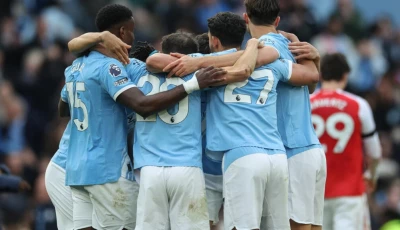 manchester city players celebrate their 2 1 win against arsenal at the etihad photo afp