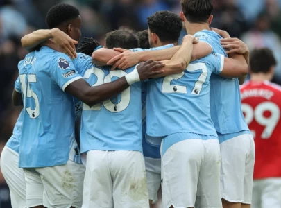 city beat arsenal to seize title race control