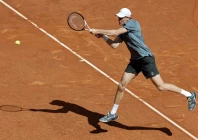 italy s jannik sinner returns a ball to france s arthur fils during the madrid open semi final clash on friday at the caja magica photo afp