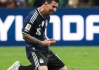 lionel messi sinks to his knees after argentina reached their second consecutive world cup final photo afp