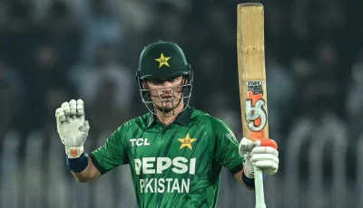 maaz sadaqat celebrates his maiden t20i fifty against sri lanka at the rawalpindi cricket stadium photo afp