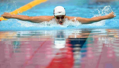 china s yu zidi competes in the final of the 400m individual medley swimming event during the 2026 asian games at the tokyo aquatics centre photo afp