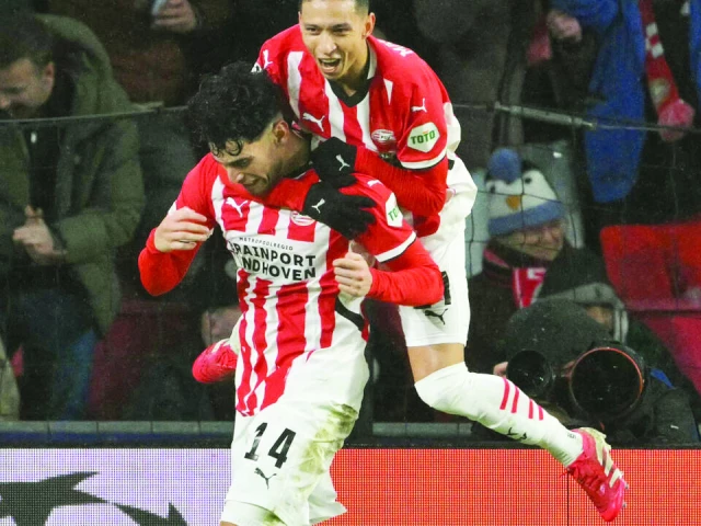 psv players celebrate a famous victory over liverpool photo afp