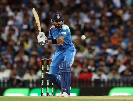 india s virat kohli in action as he hits four runs off the bowling of australia s mitchell starc photo reuters file