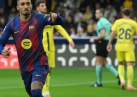 barcelona s brazilian forward raphinha celebrates scoring the opening goal against villarreal on sunday in la liga photo afp