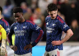 arsenal s bukayo saka and declan rice look dejected after brentford s keane lewis potter scores their first goal photo reuters