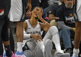 victor wembanyama exited the san antonio spurs playoff clash with the portland trail blazers after suffering a head injury photo afp