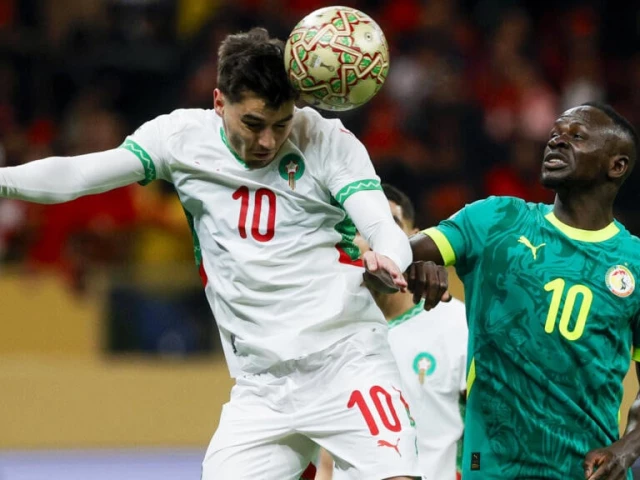 morocco striker brahim diaz l heads the ball past senegal captain sadio mane during the 2025 africa cup of nations final in rabat photo afp morocco striker brahim diaz l heads the ball past senegal captain sadio mane during the 2025 africa cup of nations final in rabat photo afp