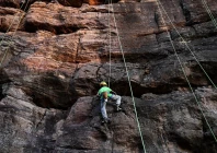 a young climber scales a rock wall in india photo afp