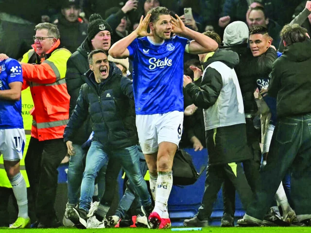 james tarkowski is mobbed by fans as he celebrates scoring everton s second goal photo afp james tarkowski is mobbed by fans as he celebrates scoring everton s second goal photo afp