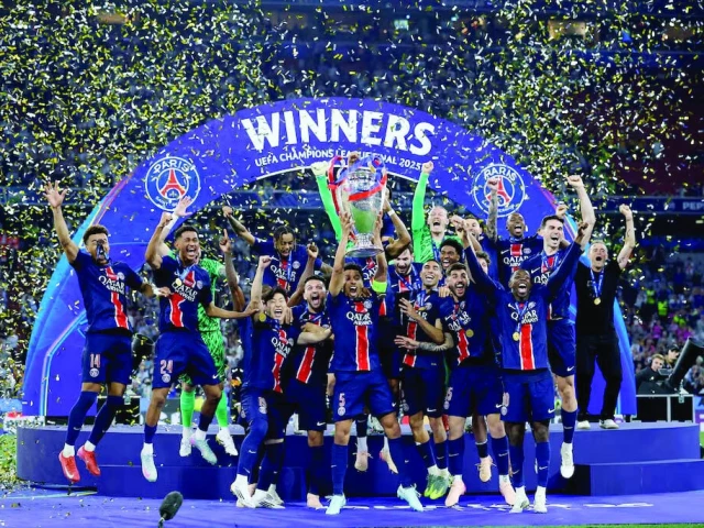 paris st germain s marquinhos lifts the trophy as he celebrates with teammates after winning the champions league photo reuters paris st germain s marquinhos lifts the trophy as he celebrates with teammates after winning the champions league photo reuters