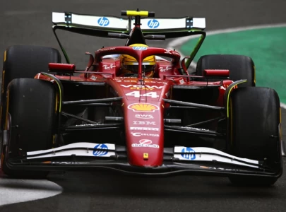 hamilton beaming after ferrari 1 2