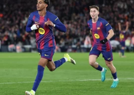 barcelona s lamine yamal c celebrates after scoring a stunning goal against real oviedo at camp nou photo afp