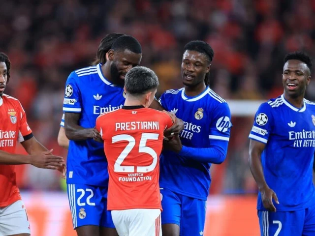 real madrid forward vinicius junior r accused benfica s gianluca prestianni of racial abuse during tuesday s champions league match photo afp real madrid forward vinicius junior r accused benfica s gianluca prestianni of racial abuse during tuesday s champions league match photo afp