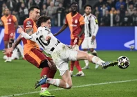 juventus turkish forward kenan yildiz kicks the ball next to galatasaray s turkish defender abdulkerim bardakci during the uefa champions league photo afp