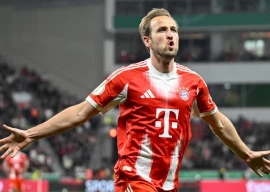 bayern munich forward harry kane has played fewer bundesliga minutes as his club is chasing champions league glory photo afp