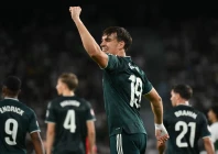real madrid s spanish forward carlos espi celebrates scoring his team s third goal against elche at martinez valero stadium in elche photo afp