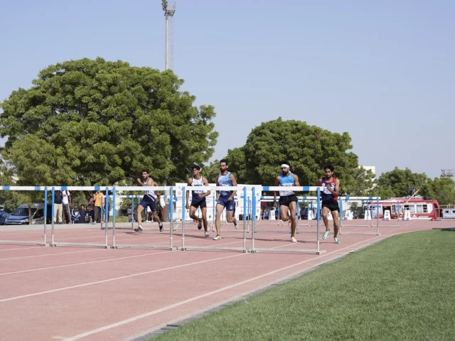 athletes compete in the 110 metre hurdles at the national athletics championship in karachi on friday photo the express tribune athletes compete in the 110 metre hurdles at the national athletics championship in karachi on friday photo the express tribune