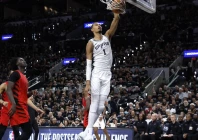 san antonio spurs star victor wembanyama delivers a dunk in the spurs series clinching victory over the portland trail blazers in the first round of the nba playoffs photo afp