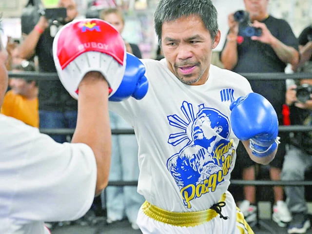 fillipino boxer manny pacquiao spars at the wild card gym in hollywood ahead of his comeback next month photo afp fillipino boxer manny pacquiao spars at the wild card gym in hollywood ahead of his comeback next month photo afp