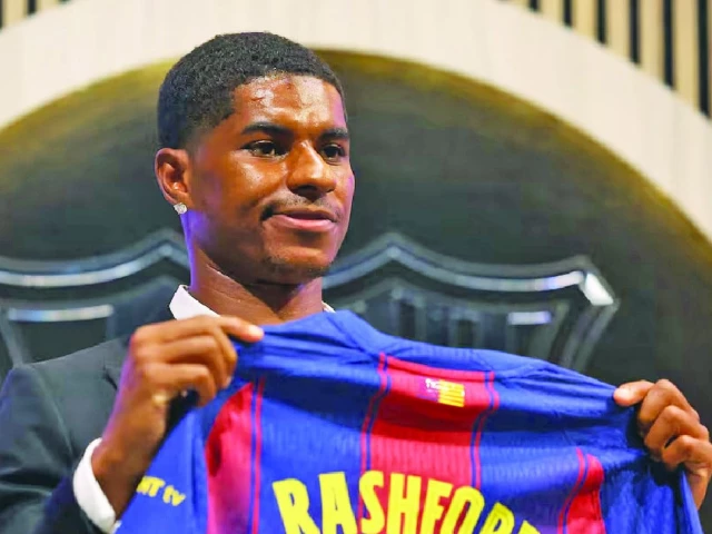 barcelona s new signing marcus rashford poses with his shirt during the presentation photo reuters barcelona s new signing marcus rashford poses with his shirt during the presentation photo reuters