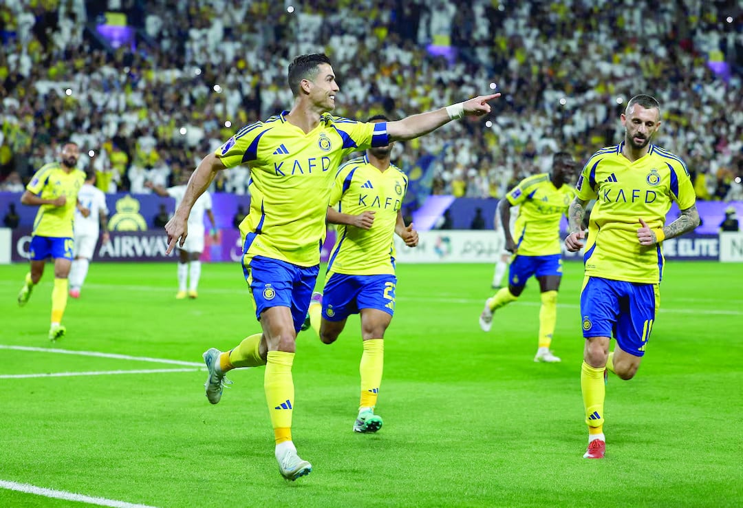 nassr s cristiano ronaldo celebrates scoring their second goal with teammate photo reuters