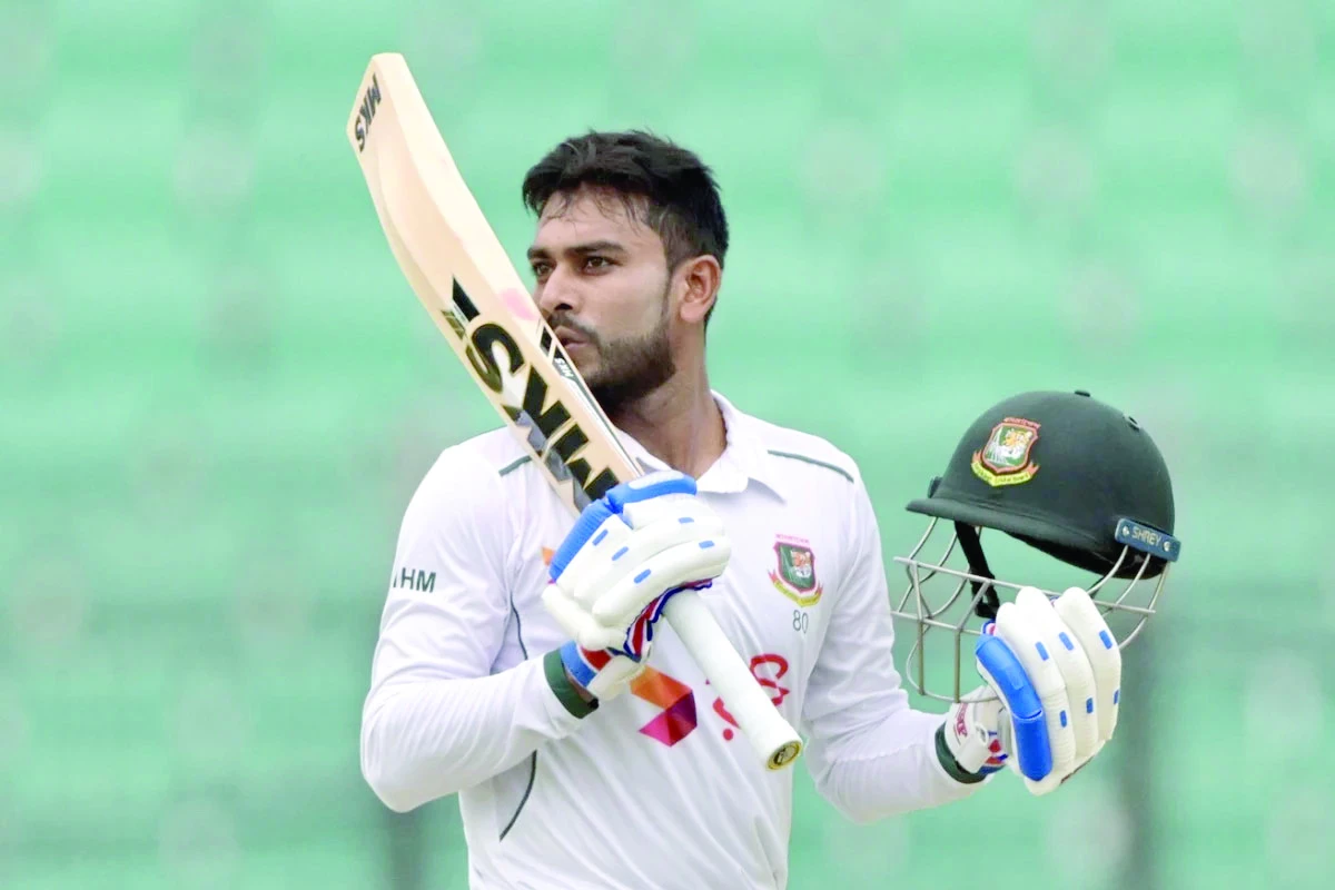 mehidy hasan miraz celebrates his century against zimbabwe photo afp mehidy hasan miraz celebrates his century against zimbabwe photo afp
