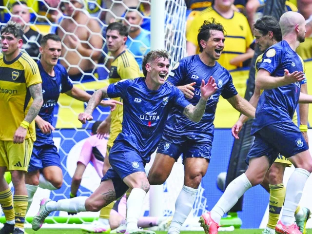 auckland city defender christian gray right celebrates scoring his team s first goal at the club world cup against boca juniors photo afp auckland city defender christian gray right celebrates scoring his team s first goal at the club world cup against boca juniors photo afp