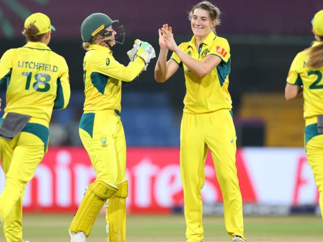 australia players celebrate wicket against new zealand photo afp